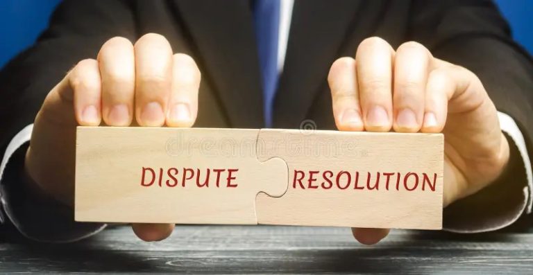 man holds wooden puzzles words dispute and resolution