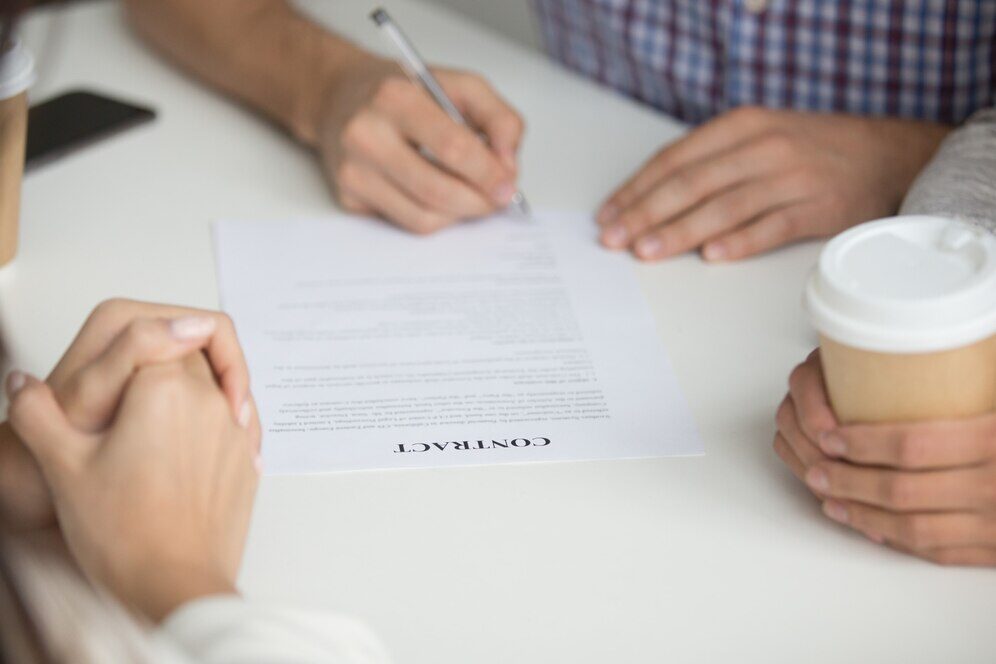 A person signing a contract