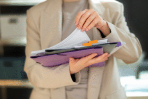 A person holding documents