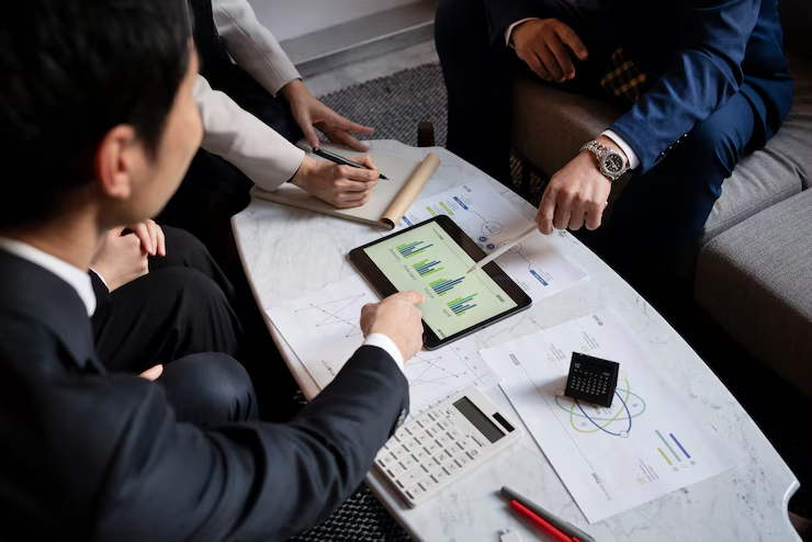People discussing a chart