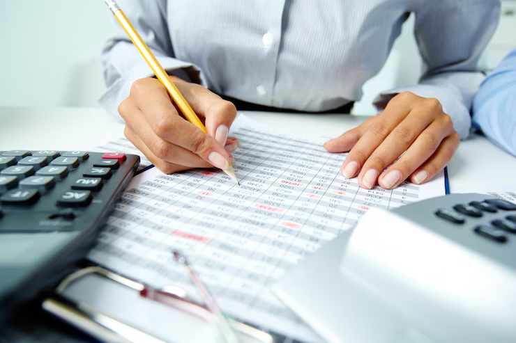 A person reviewing a document