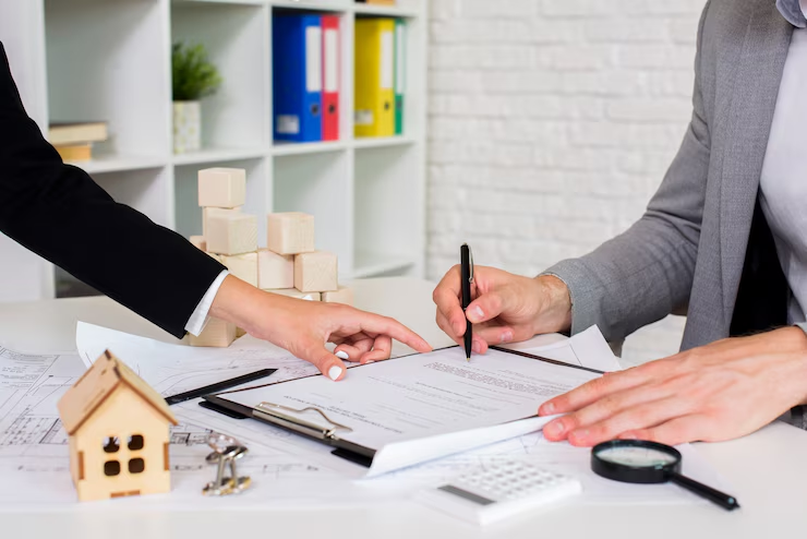 A person signing a form