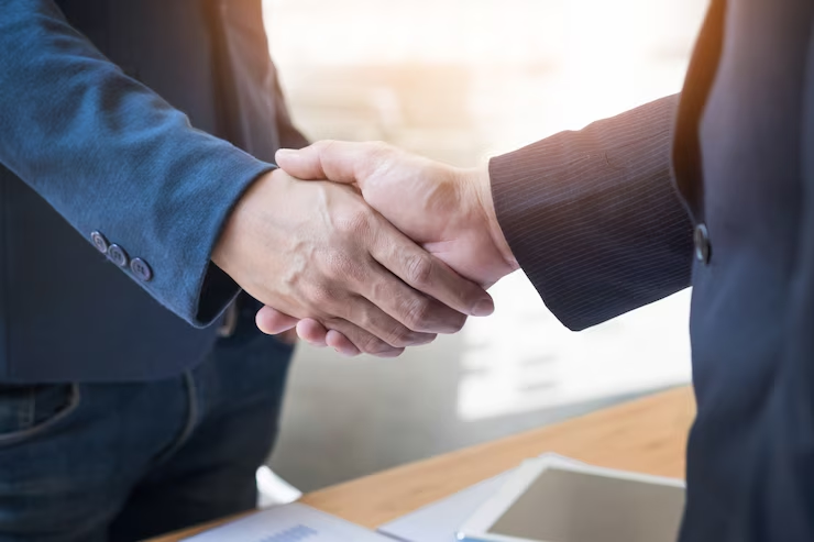 Two people shaking hands