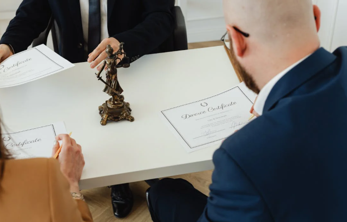 A divorce certificate document placed on a tabletop.