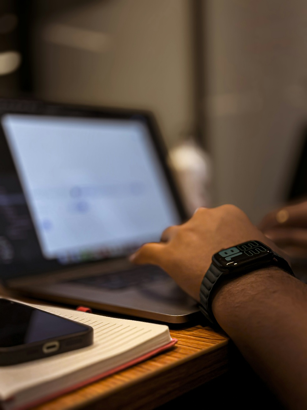 A person typing on a laptop