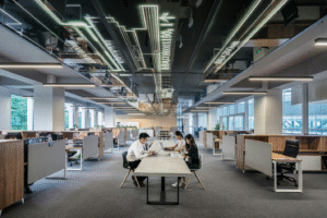 People sitting in a large office