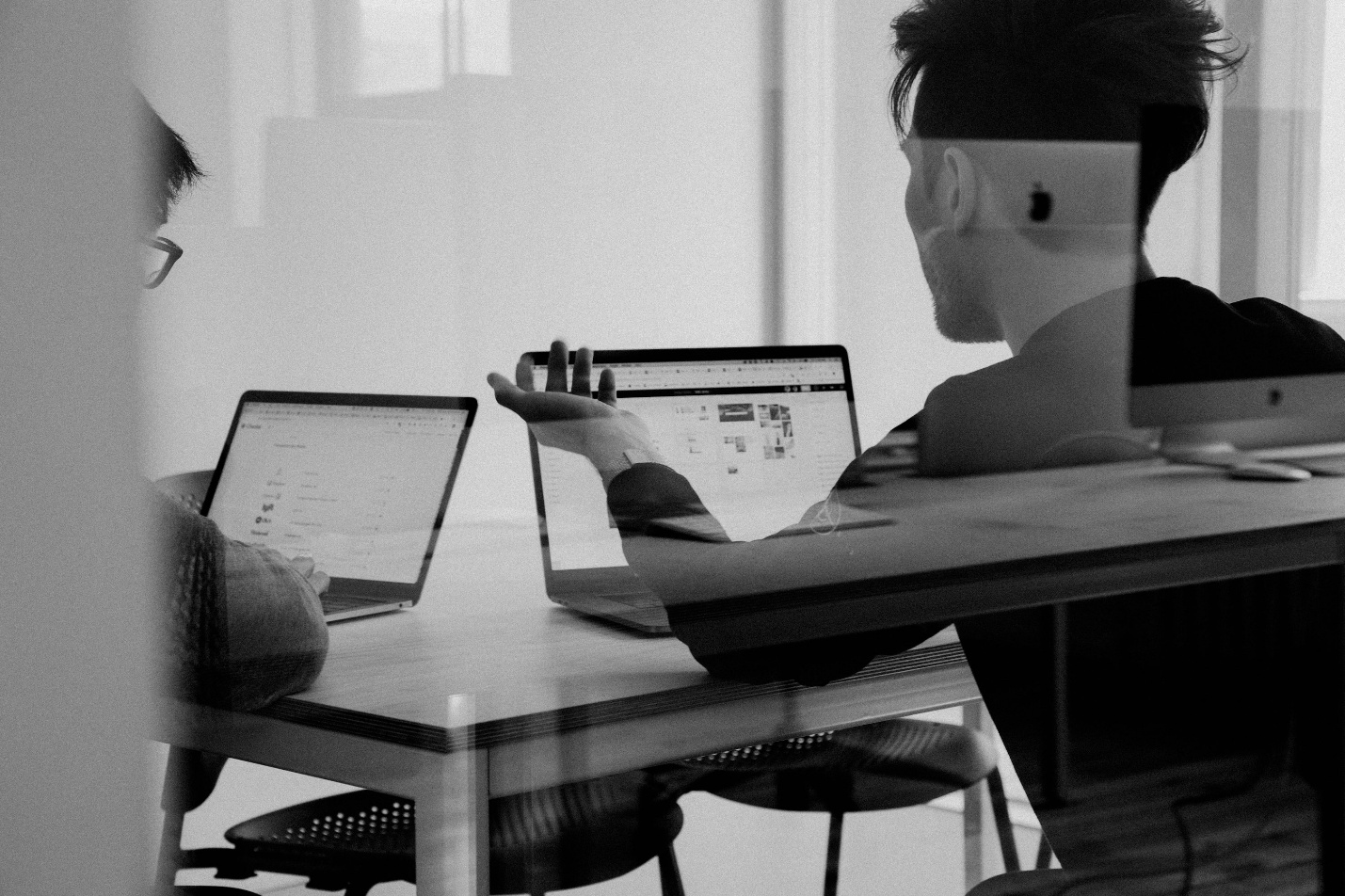 People using their laptops at work