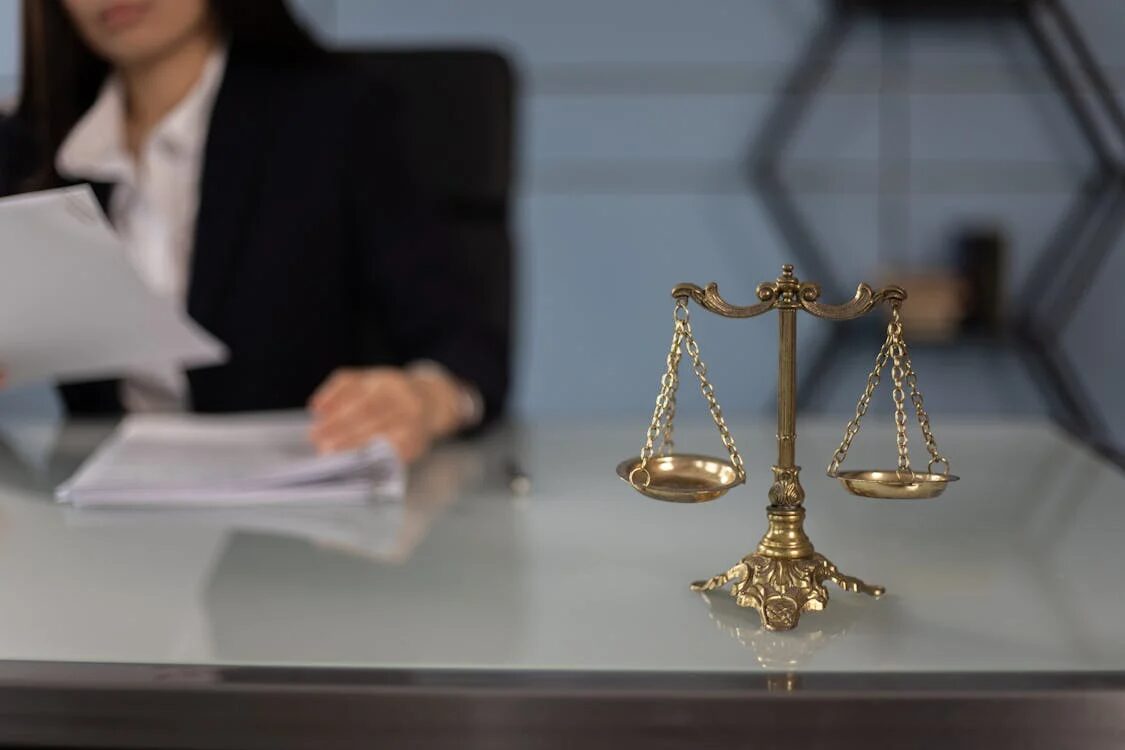 A justice scale on the table