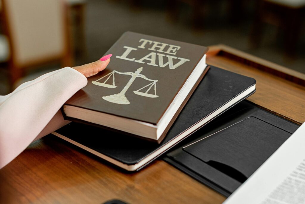 A person holding a law book