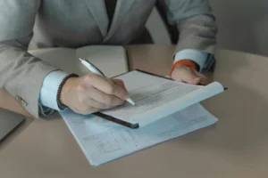 A person signing a contract