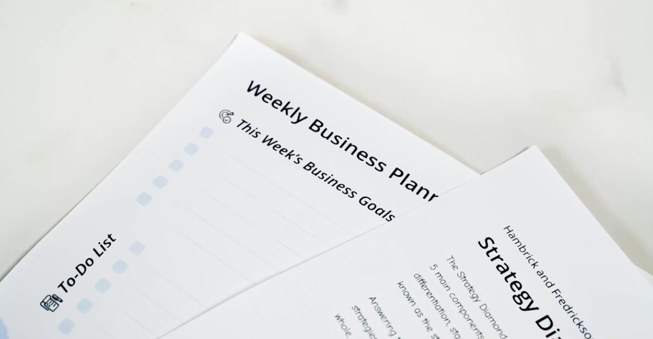 This photo shows a black-and-white printout of business planners.