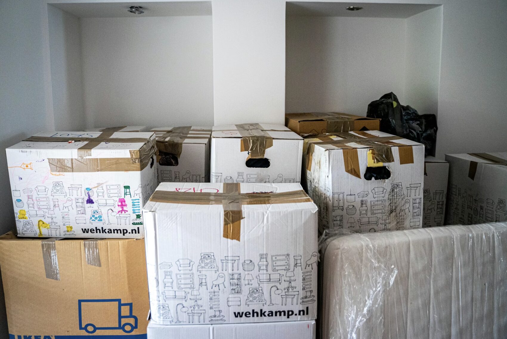 This photo shows packed boxes inside the space, suggesting an early exit.