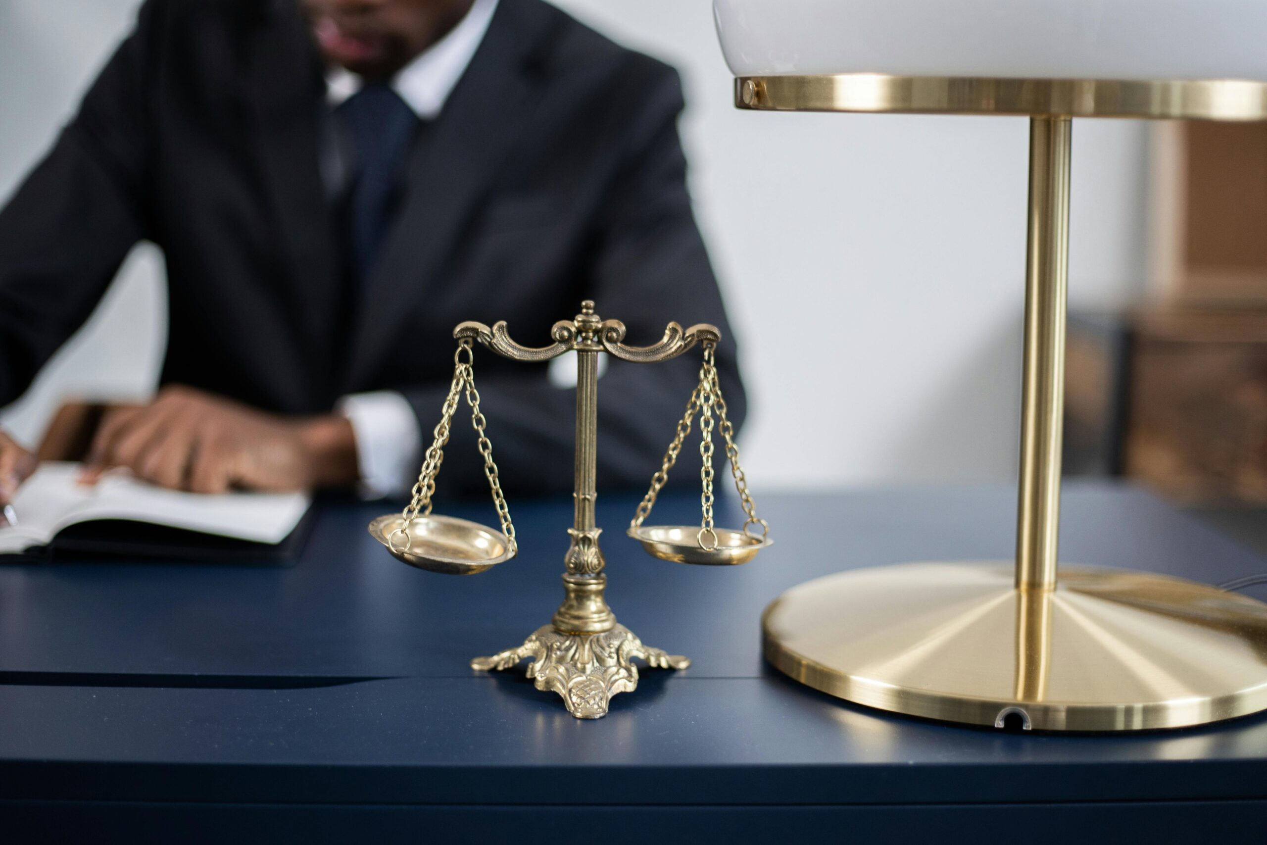 a balanced scale on an attorney’s desk