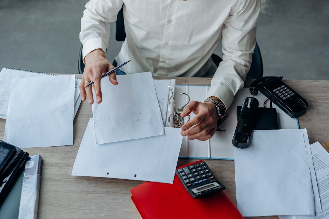 Documents on a person’s desk