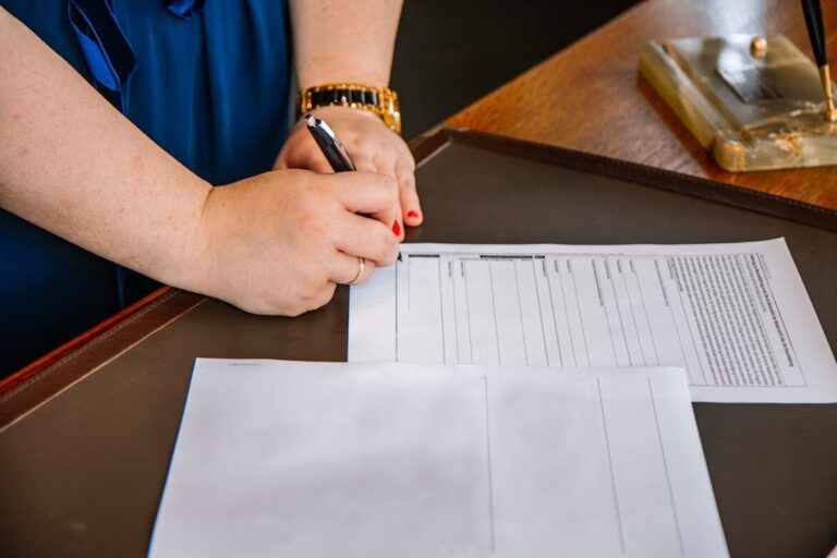A person signing a contract