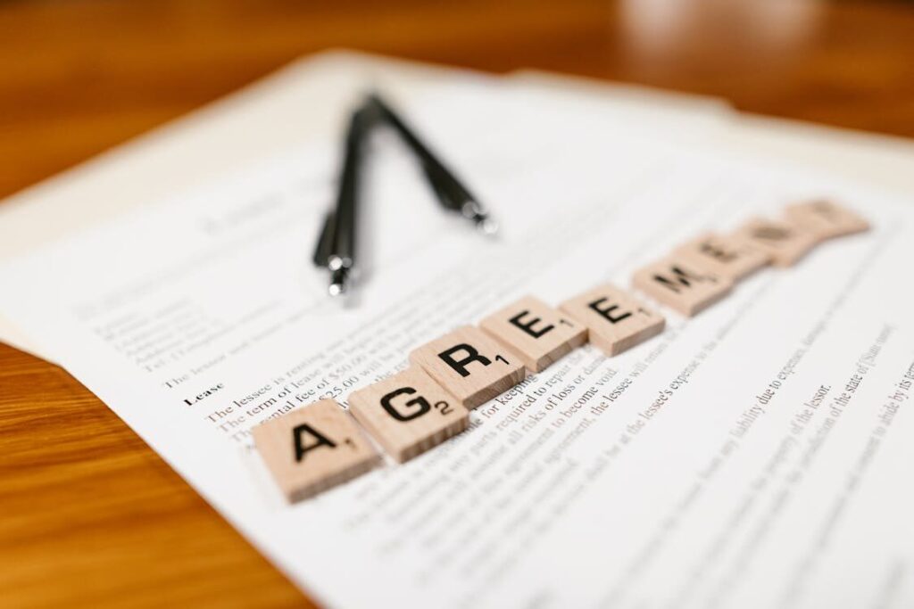Scrabble tiles on papers
