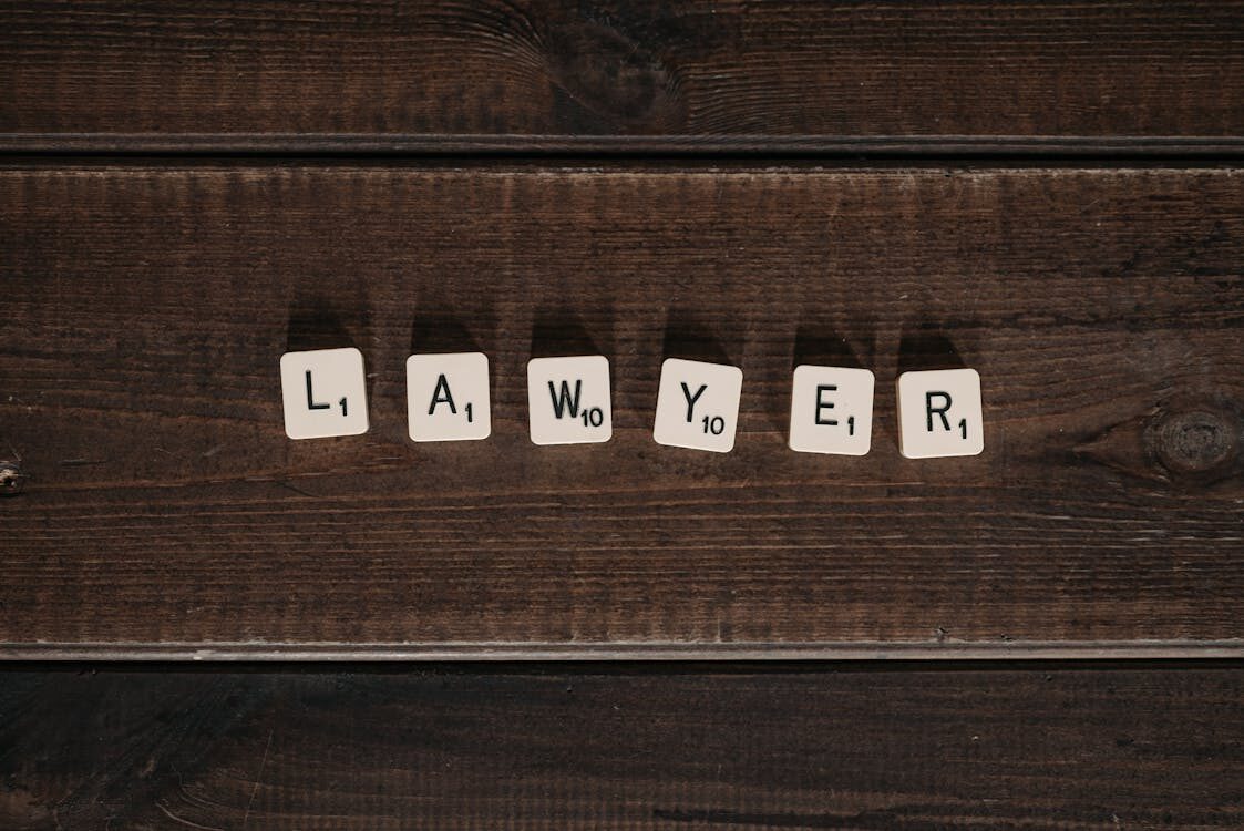 Scrabble tiles on a wooden surface 