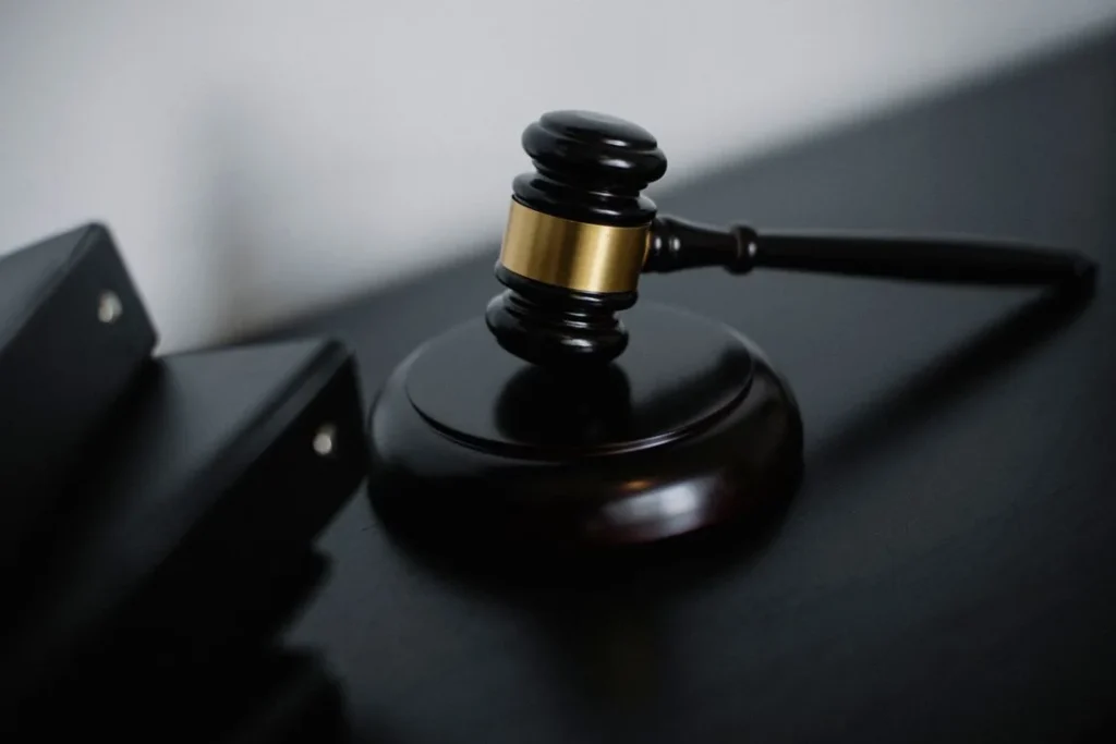 A gavel next to files