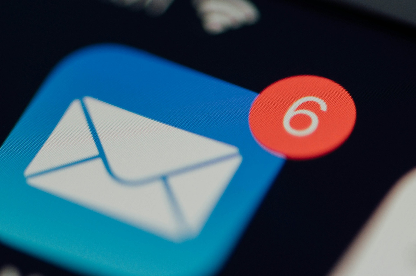 Mail icon on a phone showing 6 unreal emails