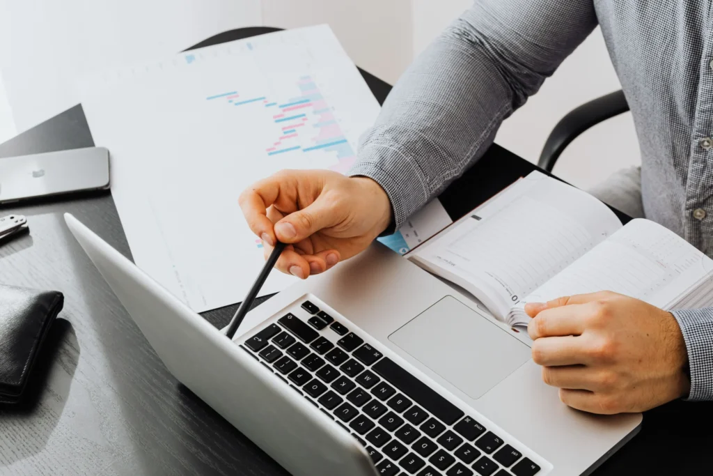 a person reviewing documents and reports