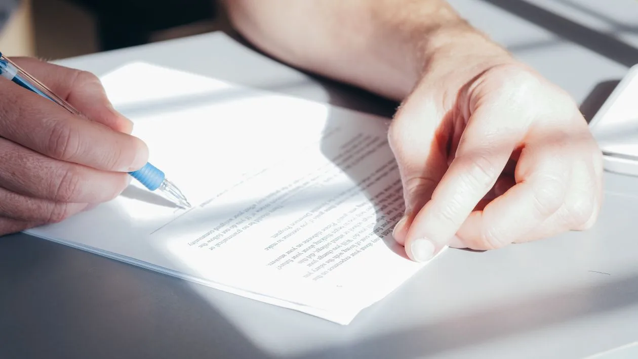 A person reviewing a document