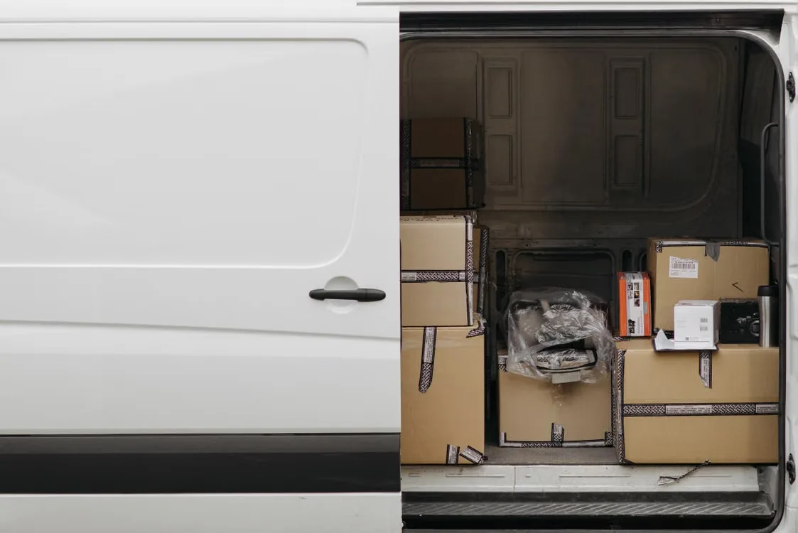 A delivery van with boxes
